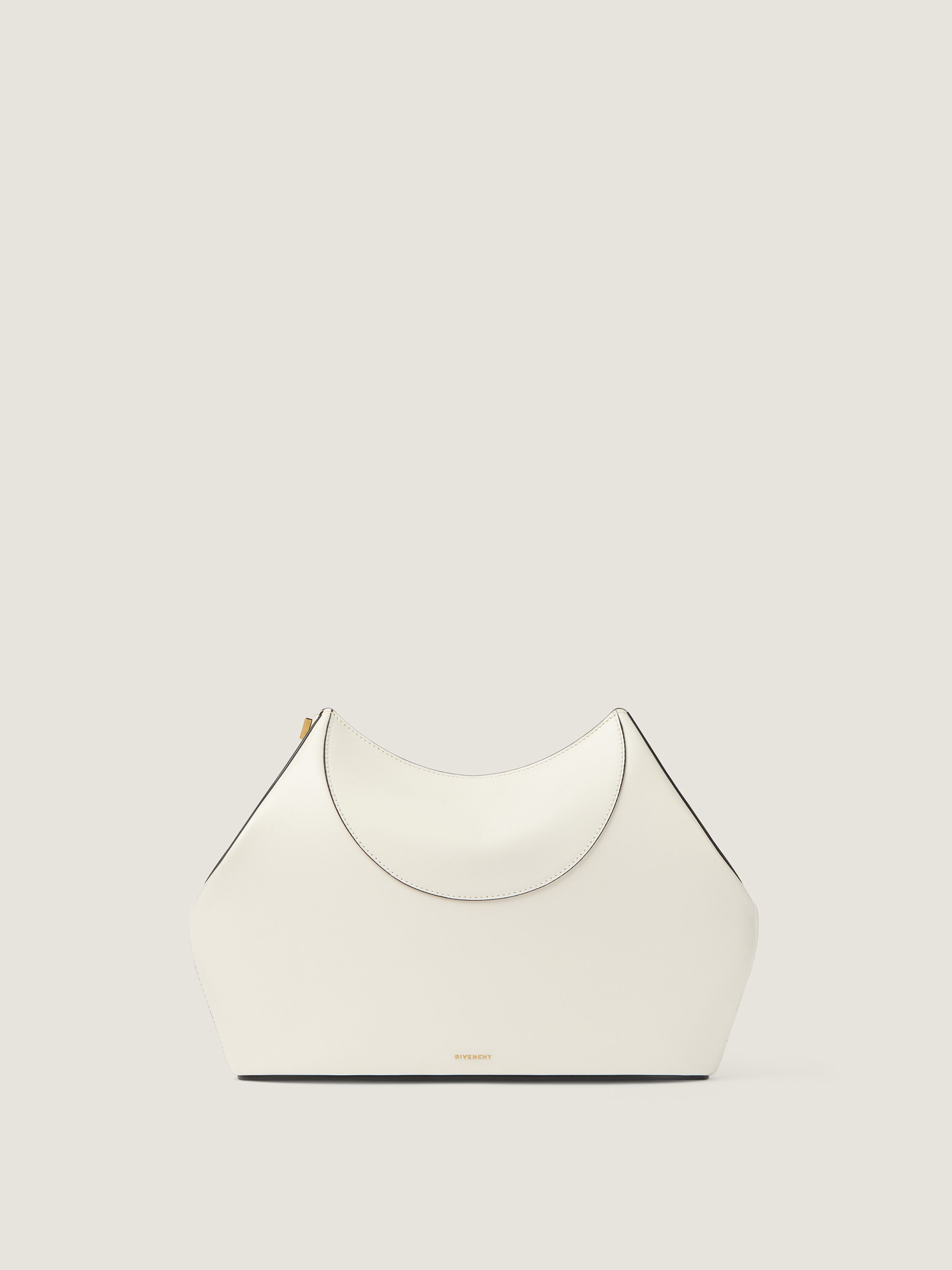 Facet clutch in leather